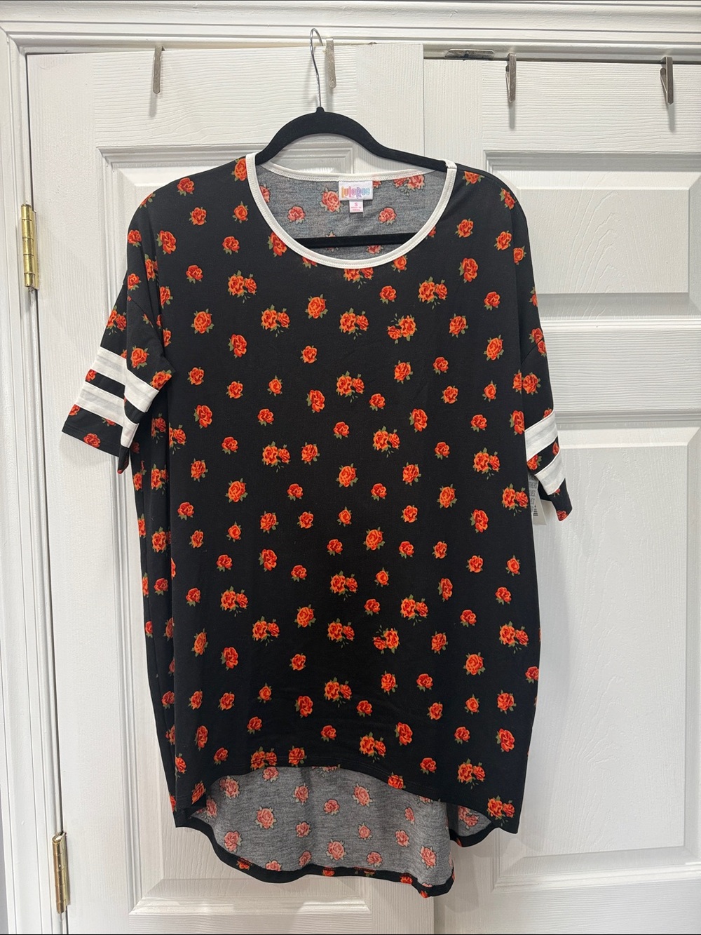 LuLaRoe Irma Small Black Tee with Red Rose Print and White Stripe Sleeves